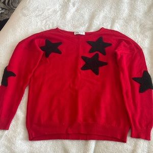 Pinc red sweater, black Sherpa stars, amazing for holiday celebrations!